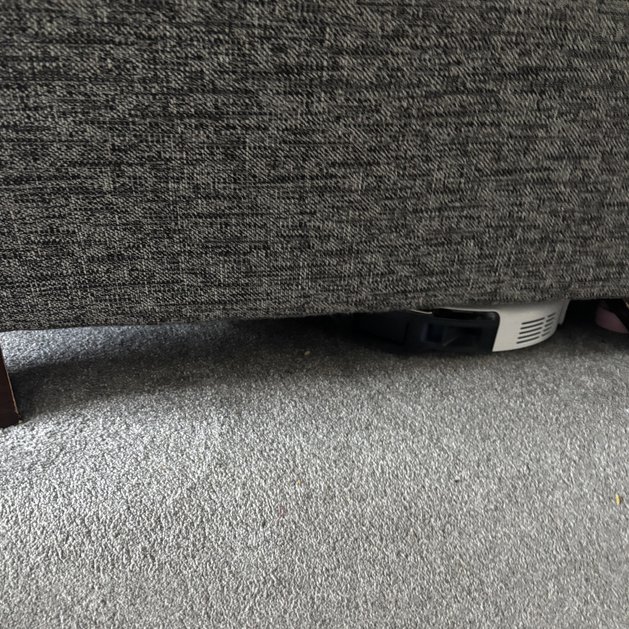 eufy C10 visible underneath sofa
