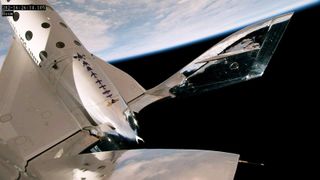 Photo of Virgin Galactic's VSS Unity space plane, with the curve of Earth and the blackness of space in the background.