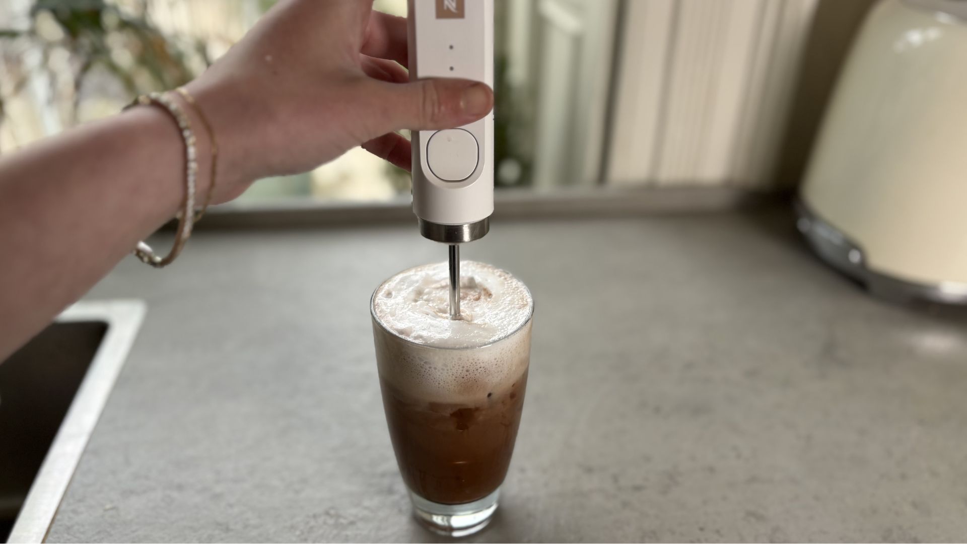 Nespresso NanoFoamer Milk Frother being tested
