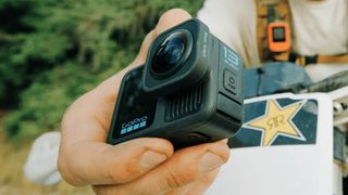 GoPro Hero13 Black with UltraWide lens mod on in hand
