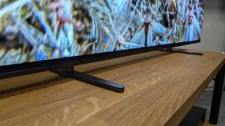 Sony Bravia 8 65-inch OLED TV on wooden rack showing detail of feet