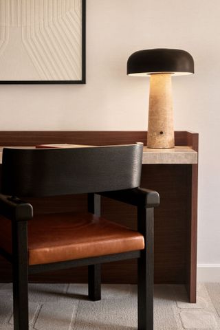 Close-up of a chair and lamp