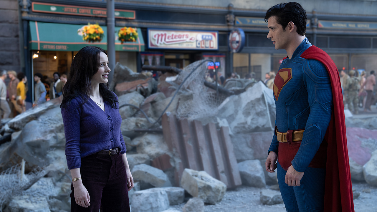 Lois Lane and Clark Kent standing on a street surrounded by rubble in James Gunn's Superman film