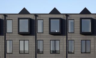 Image of the outside close up of the modern terrace housing development