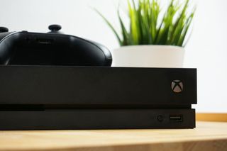 Xbox One X Low Profile on table