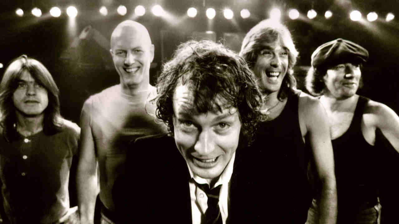 AC/DC posing for a photograph in 1990