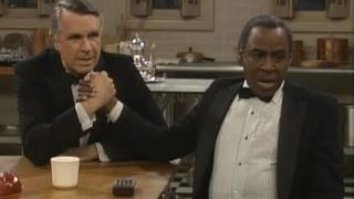 James Noble and Robert Guillaume hold hands while waiting for election results in the Benson series finale.