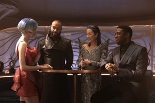 A group of sci-fi characters in a futuristic space station bar