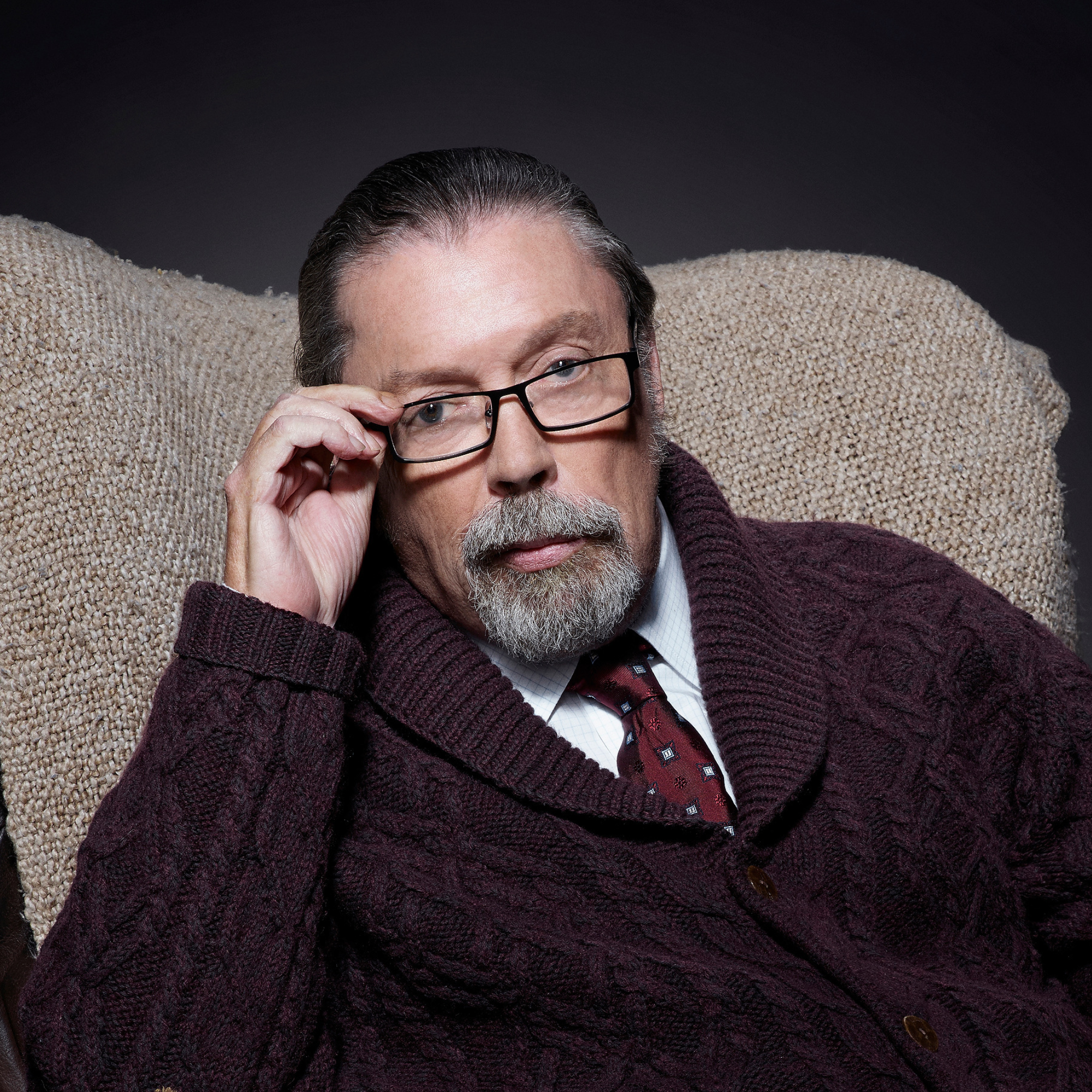 Tim Curry as Criminologist Narrator in THE ROCKY HORROR PICTURE SHOW: LET'S DO THE TIME WARP AGAIN