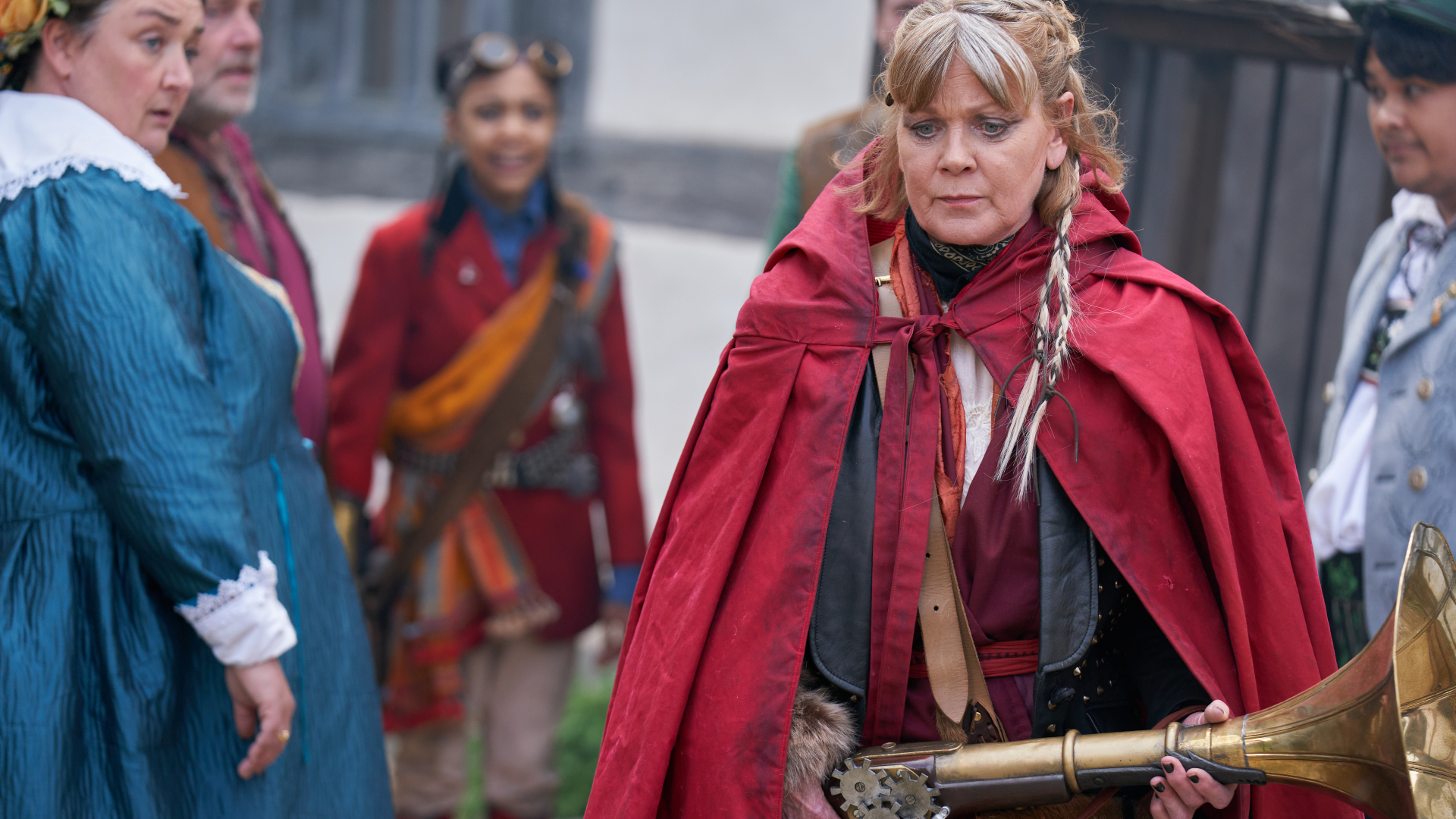 Samantha Bond as Red Riding Hood holding her weapon in Little Red Riding Hood: After Ever After