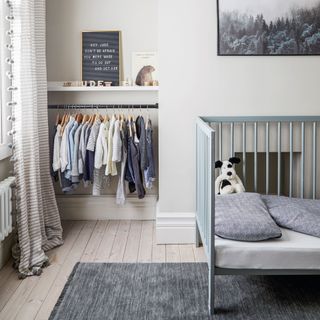 Light grey children's room with built in clothes rail and day bed