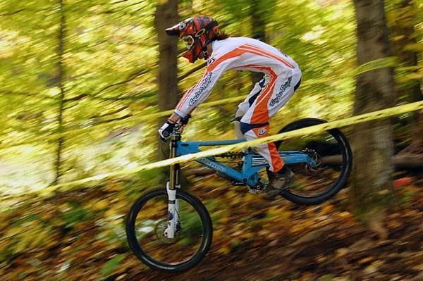 A rider races the downhill.