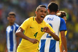 Marquinhos celebrates after scoring for Brazil against Honduras in the men's football tournament at the 2016 Olympics.