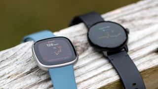 Heart rate tracking on Fitbit Versa 4 next to Google Pixel Watch