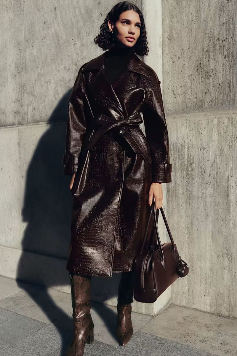 woman wearing leather trench coat