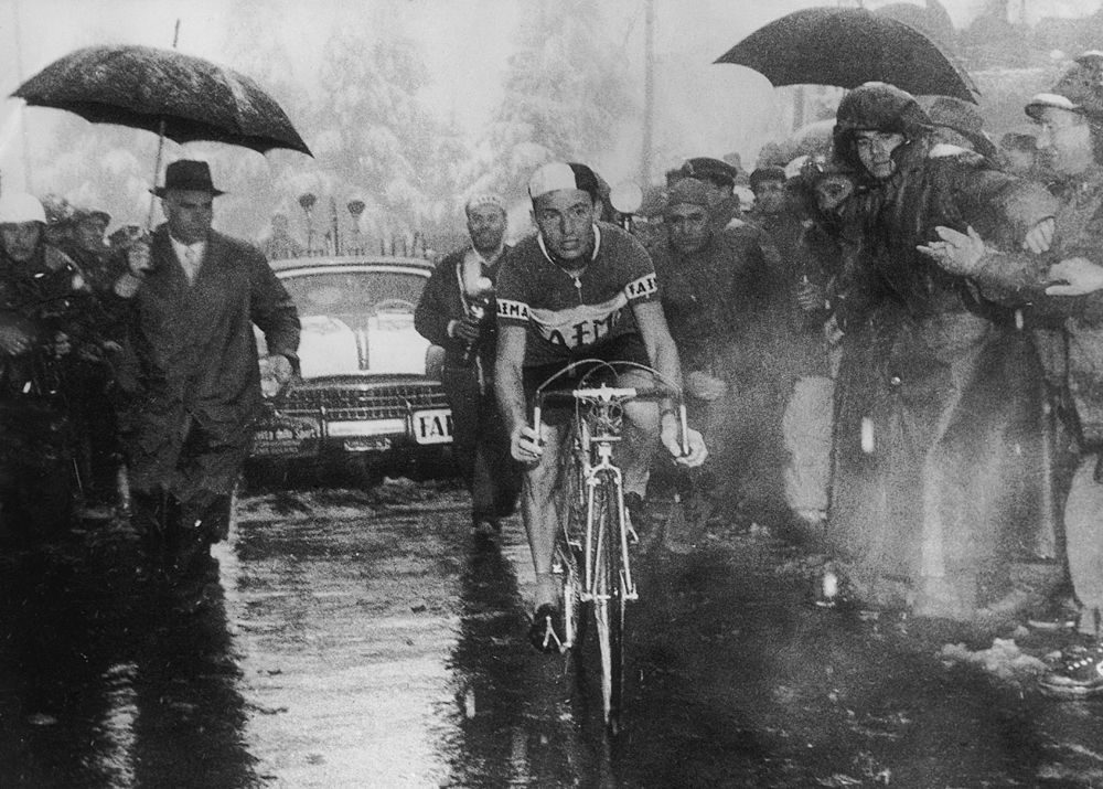 Charly Gaul wins the Dolomites stage of the Giro d'Italia in 1956 before he collapsed from cold and exhaustion. He went on to win the overall.