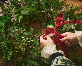 Attaching bow to wreath