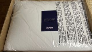 Purple DreamLayer Pillow shown in box