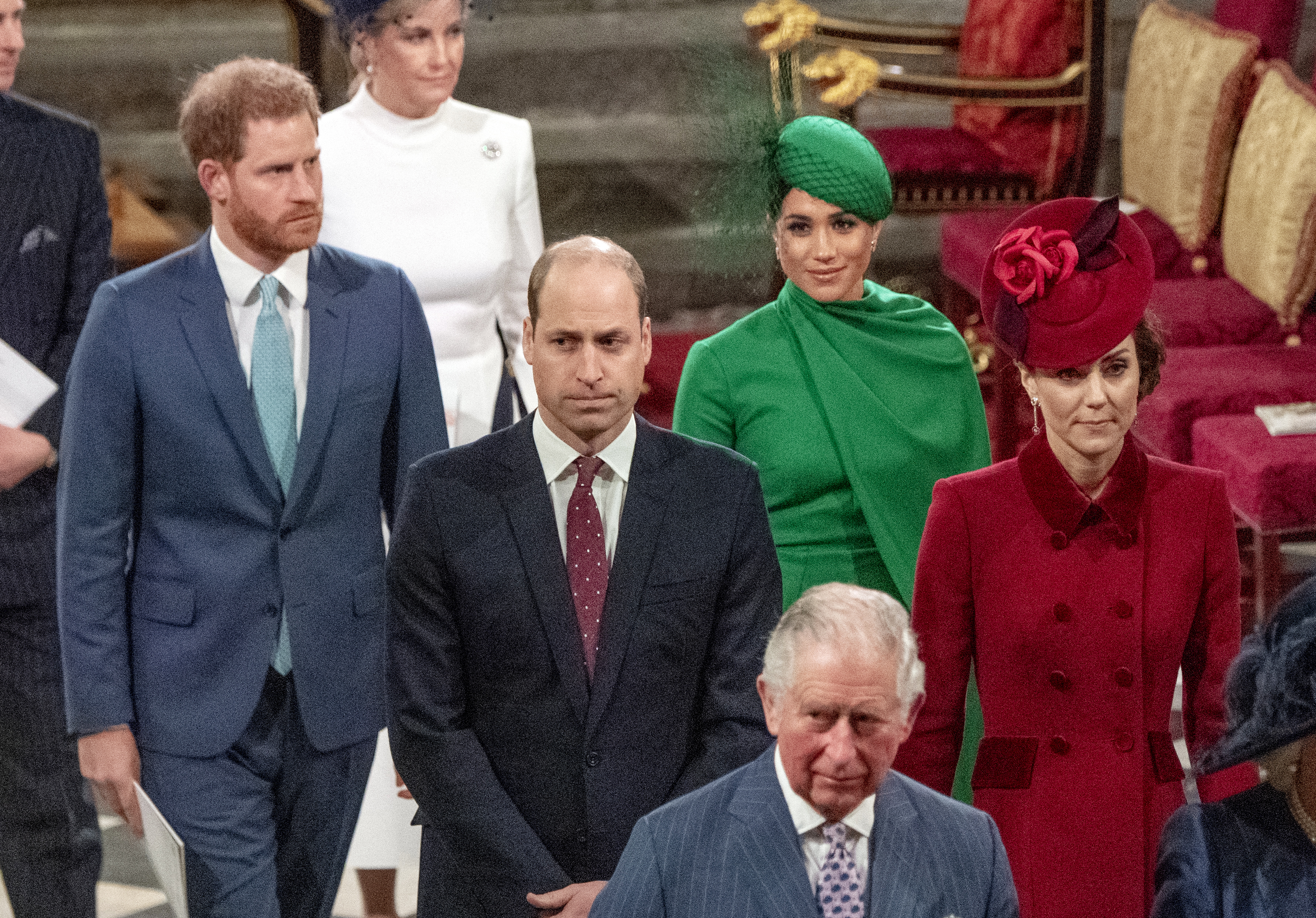 Prince Harry and Meghan Markle walking behind Prince William, Princess Kate and King Charles on Commonwealth Day 2020