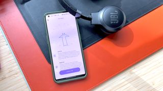 JBL Live 670NC showing app's personalized sound report
