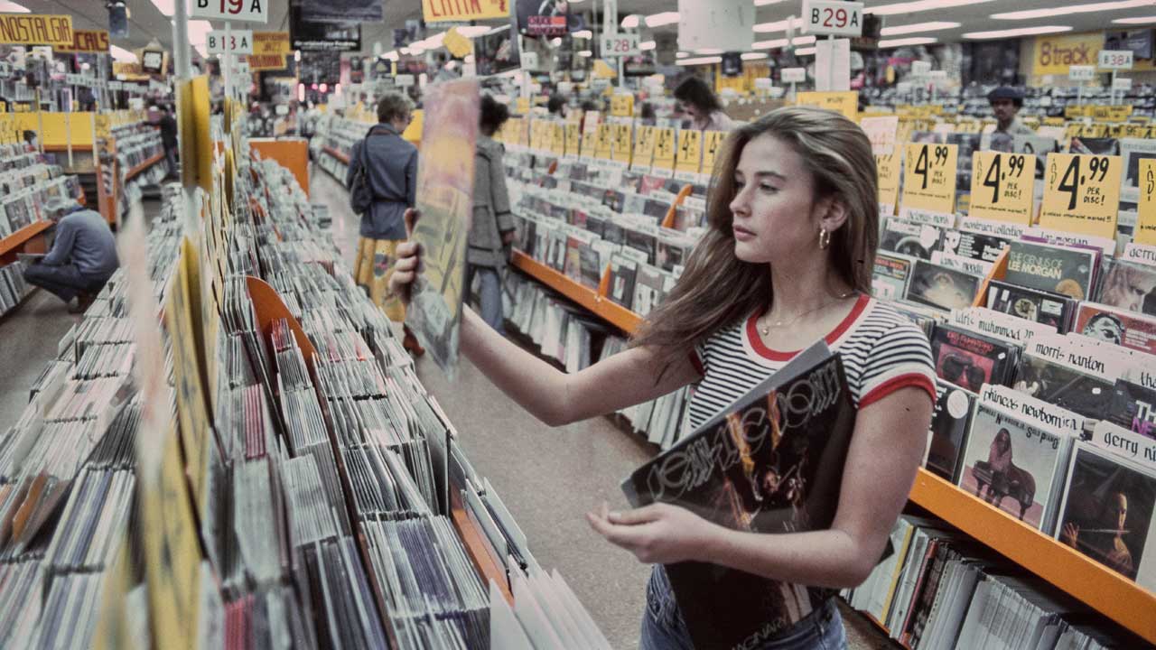 A 15-year-old Demi Moore record shopping in 1977