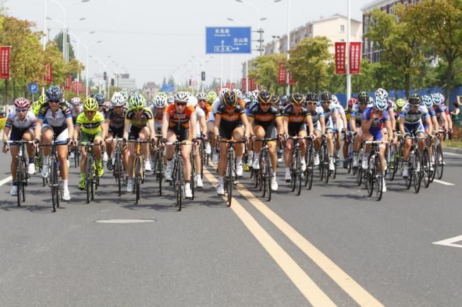 The bunch once more uses the full width of the road