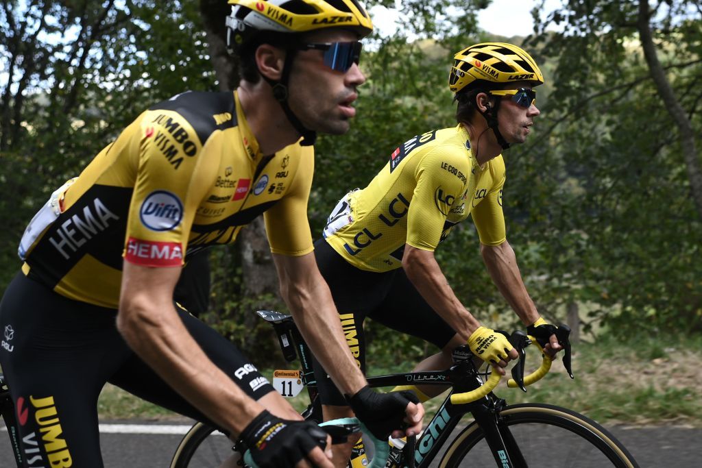 Team Jumbo rider Netherlands Tom Dumoulin L and Team Jumbo rider Slovenias Primoz Roglic wearing the overall leaders yellow jersey ride during the 13th stage of the 107th edition of the Tour de France cycling race 191 km between ChatelGuyon and Puy Mary on September 11 2020 Photo by Marco BERTORELLO AFP Photo by MARCO BERTORELLOAFP via Getty Images