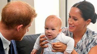 Prince Harry, Duke of Sussex and Meghan, Duchess of Sussex with Archie at a meeting with Archbishop Desmond Tutu
