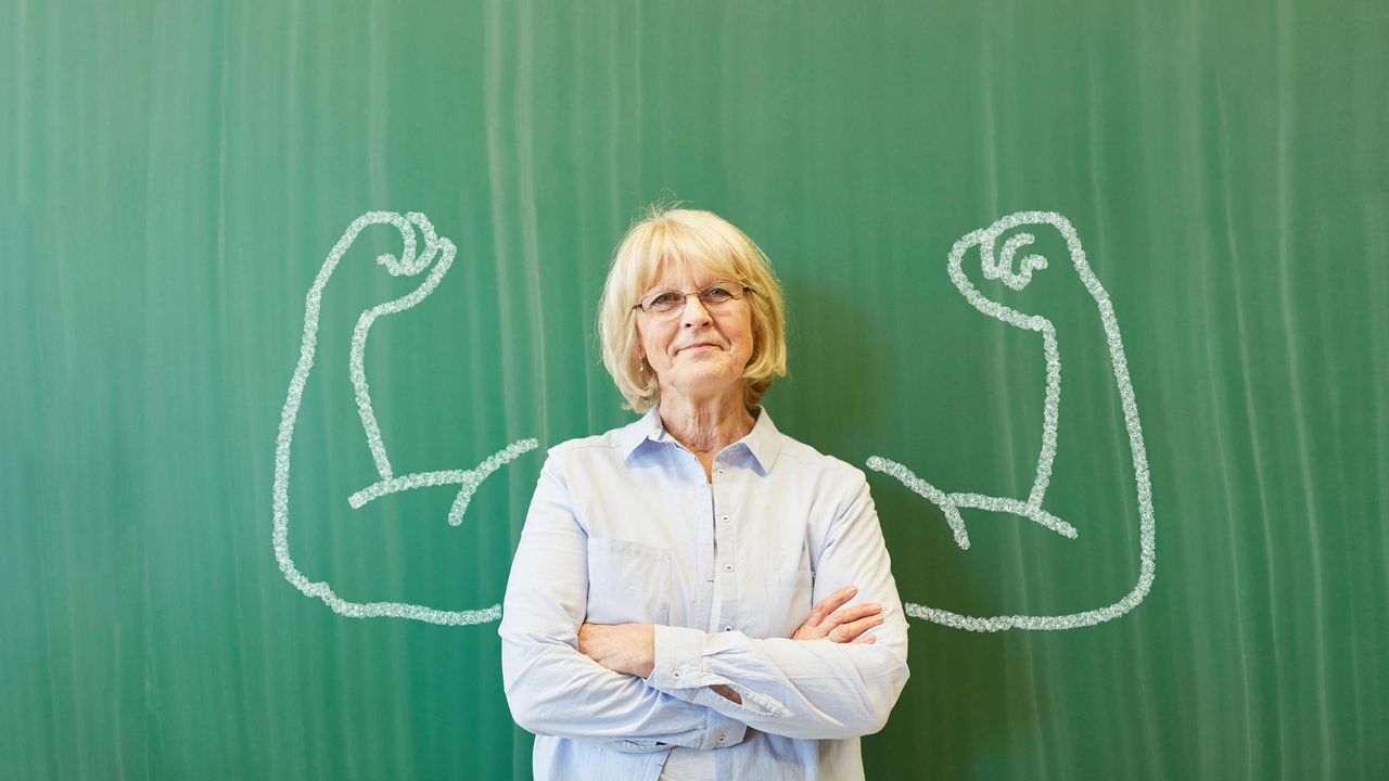 Woman standing at a blackboard