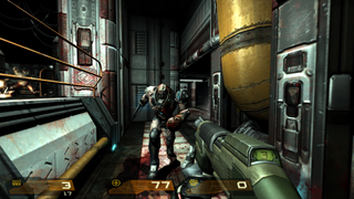Wielding a shotgun, the player is charged by a 'Berserker' Strogg.