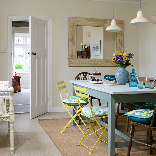 dining room with dining table and flower vase pot