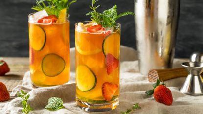 Sweet Refreshing Pimms Cup Cocktail with Fruit and Mint