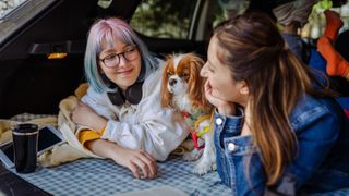 Couple on holiday with their dog