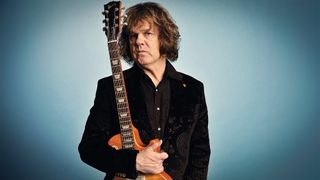 Gary Moore poses withe the Les Paul he bought from Peter Green at a portrait shoot for Guitarist Magazine, November 20, 2008, London