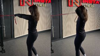 Woman demonstrates two positions of the banded face pull with a resistance band
