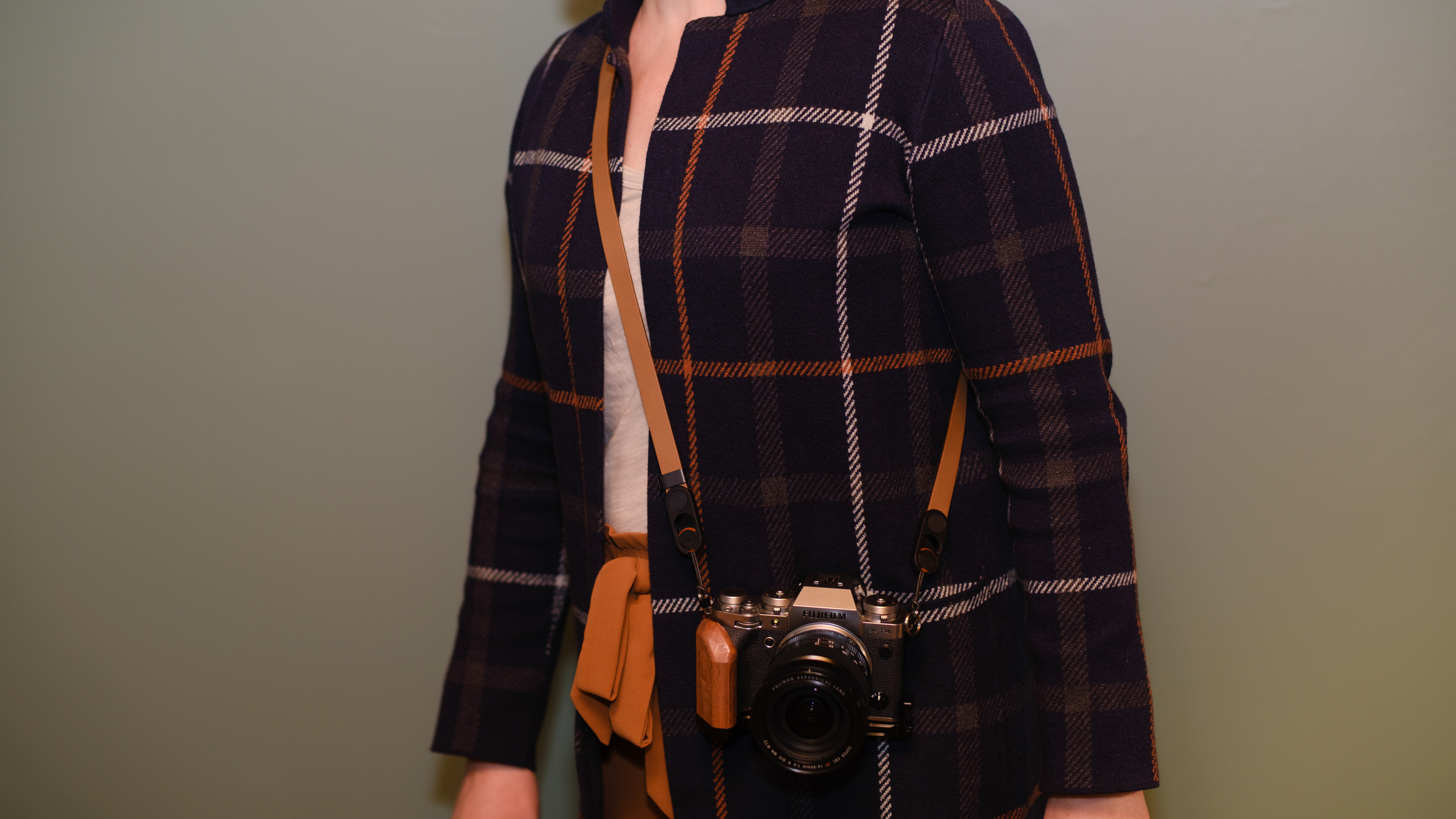 The Peak Design Form leather camera strap in the Amber color