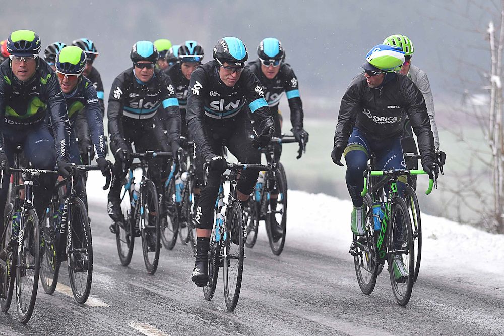 Team Sky's Ian Stannard braces against the cold.