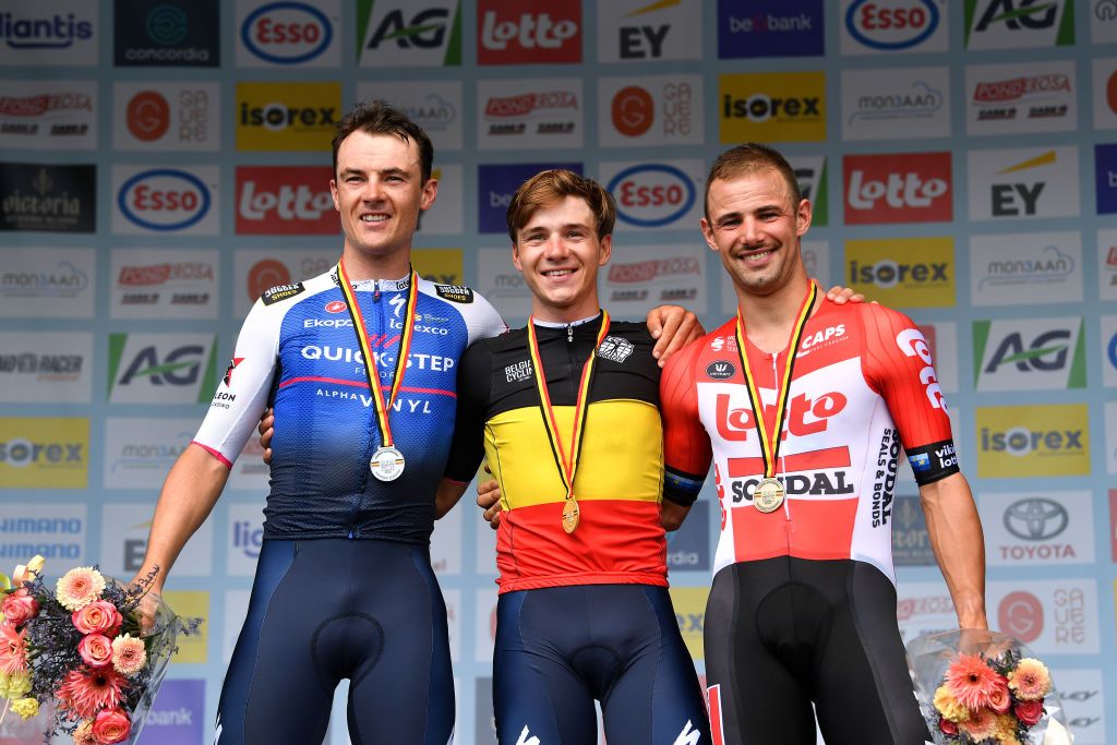 GAVERE BELGIUM JUNE 23 Silver medalist Yves Lampaert of Belgium gold medalist Remco Evenepoel of Belgium and bronze medalist Victor Campenaerts of Belgium pose on the podium during the medal ceremony after the 123rd Belgian Road Championship 2022 Mens Individual Time Trial a 348km individual time trial one day race from Gavere to Gavere ITT BelgianCycling140 on June 23 2022 in Gavere Belgium Photo by Luc ClaessenGetty Images