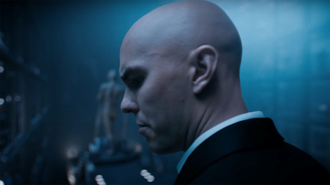 A close up of Lex Luthor looking over his left shoulder in 2025's Superman movie
