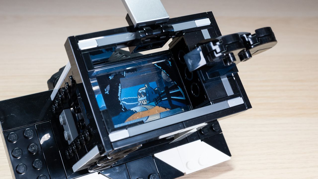 The Lego Disney Walt Disney Tribute Camera, a close-up of the multi-plane camera build, showing a moonlit landscape