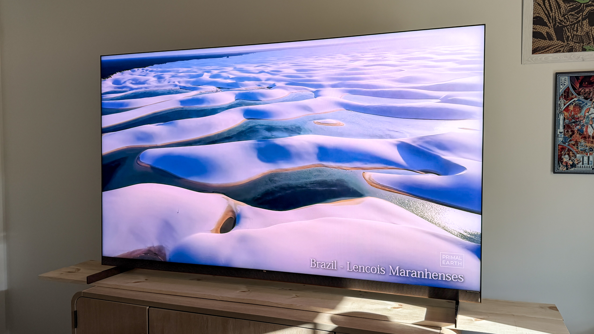 TCL X11L SQD Mini-LED TV on a side table