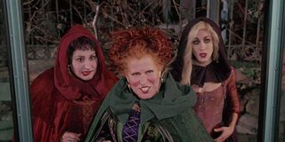 The Sanderson Sisters wait to board a bus in a scene from 'Hocus Pocus'
