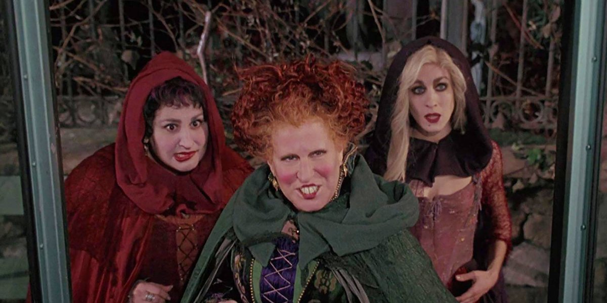 The Sanderson Sisters wait to board a bus in a scene from &#039;Hocus Pocus&#039;