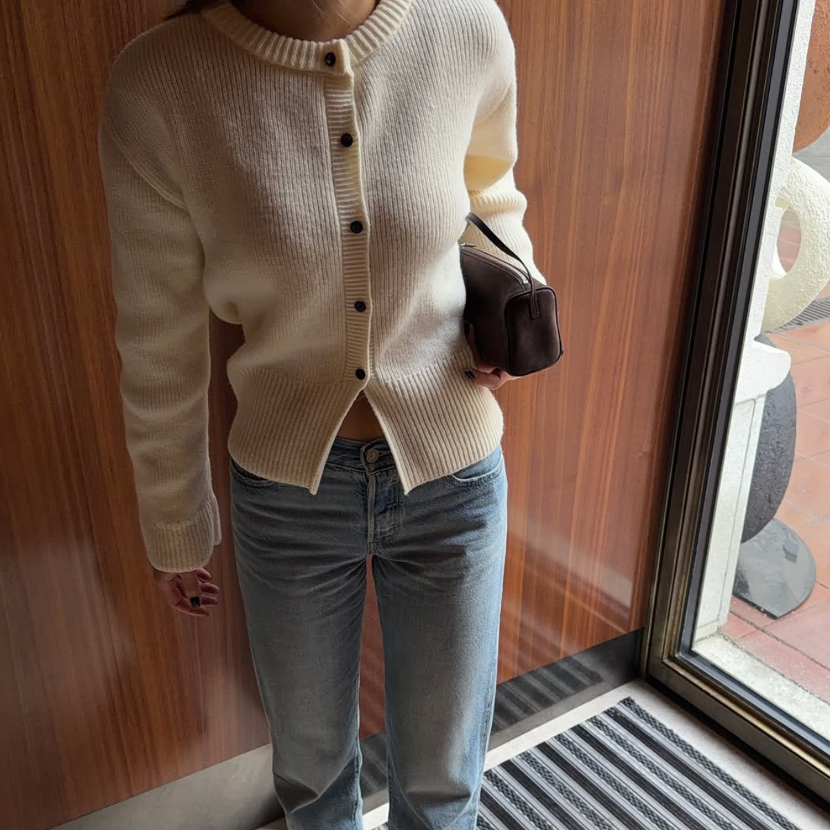 woman wearing winter sweater trend 2025