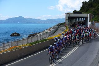 The peloton races along the sea during stage 5 at the Giro d'Italia 