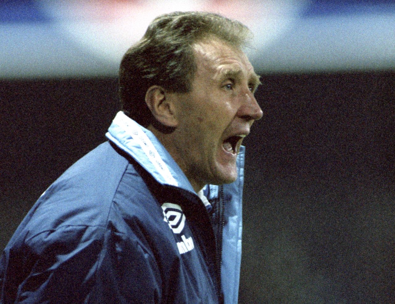 Leeds United manager Howard Wilkinson shouts instructions during a match, 1991