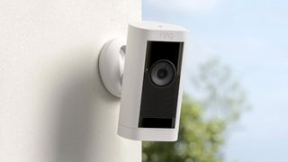 Ring Stick Up Cam Pro attached to side of house