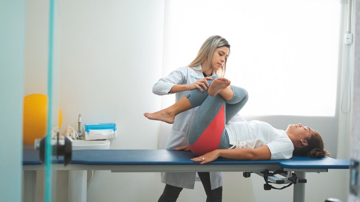 Osteopath and patient