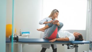 Osteopath and patient