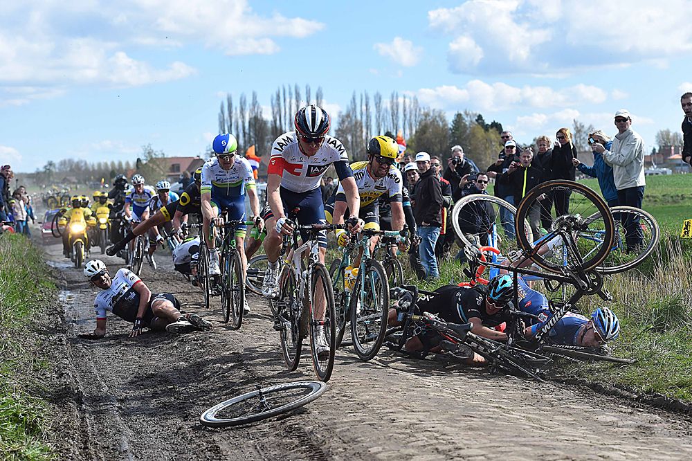 Riders avoid the crash after Fabian Cancellara (Trek-Segafredo) goes down at Fabian Cancellara (Trek Factory Racing) takes an unfortunate crash at Paris-Roubaix